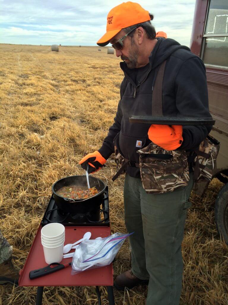 The Sporting Chef making Pheasant Stew in the field.