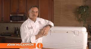 Chef John McGannon by a cooler on The Sporting Chef TV show sharing wild game cooking secrets