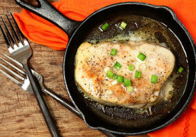 fish in cast iron pan 